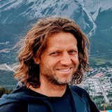 Dr. Simon Baker, Board Member